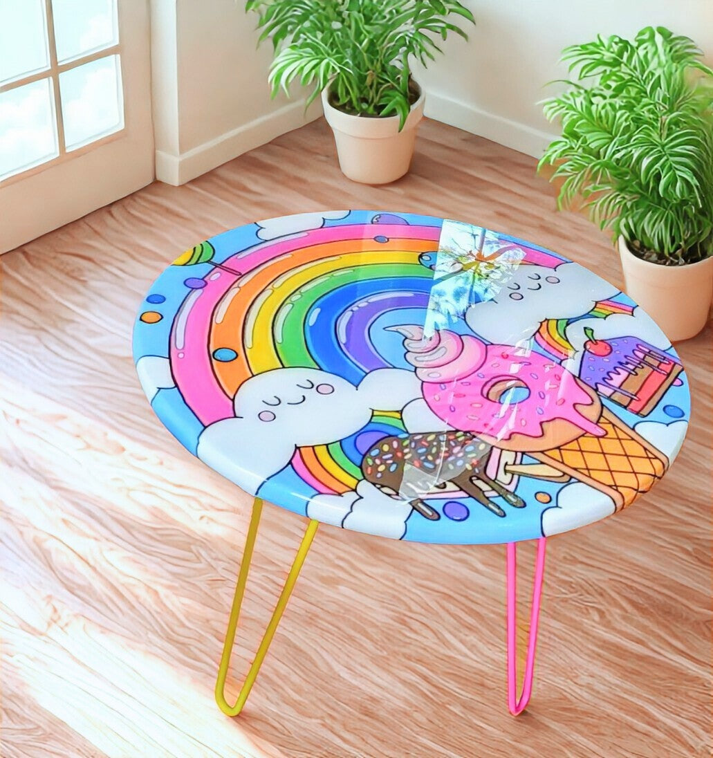 Whimsical rainbow epoxy kids table for playrooms, nurseries, or living rooms — hand-painted, functional art for colorful home decor and gifting.