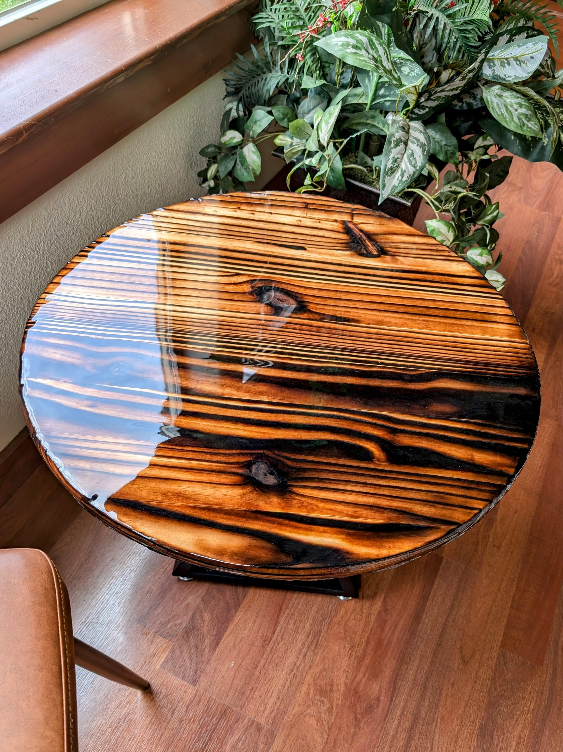 Handcrafted Shou Sugi Ban coffee table with deep-burned wood and epoxy resin — perfect for man caves, game rooms, and entertainment spaces