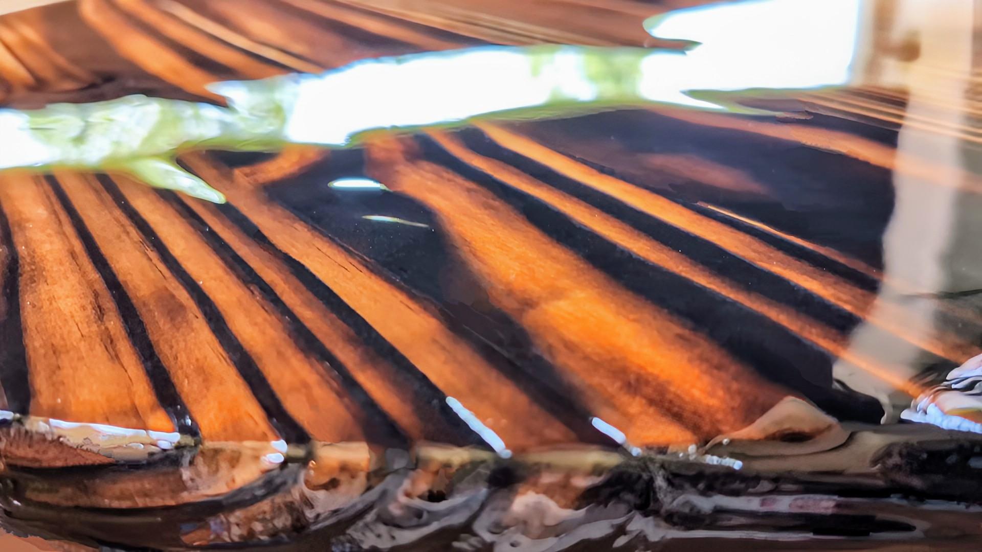 Handcrafted Shou Sugi Ban coffee table with deep-burned wood and epoxy resin — perfect for man caves, game rooms, and entertainment spaces